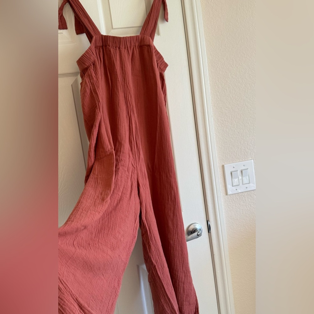 Madewell. Tie shoulder jumpsuit. Pretty mauve rust color. Size L